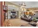 Spacious living room with fireplace and high ceilings at 6210 W Foothill Dr, Glendale, AZ 85310