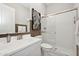 Clean bathroom with white subway tiles, a shower, and a vanity at 671 E Greenback Dr, San Tan Valley, AZ 85140