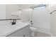 Clean bathroom with white subway tiles and gray vanity at 671 E Greenback Dr, San Tan Valley, AZ 85140