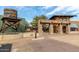 Stagecoach Village Marketplace entrance with water tower and shops at 7402 E Carefree Dr # 113, Carefree, AZ 85377