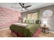 Bedroom with flamingo wallpaper and green bedding at 7529 E Windsor Ave, Scottsdale, AZ 85257