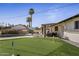 Home features a putting green, pool, and hot tub at 8227 E Hubbell St, Scottsdale, AZ 85257