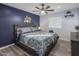 Spacious Primary bedroom with king-size bed and ceiling fan at 8227 E Hubbell St, Scottsdale, AZ 85257