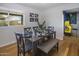 Dining room features a dark wood table and seating for four at 8227 E Hubbell St, Scottsdale, AZ 85257