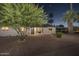 Charming single-story home with a well-manicured front yard at 8227 E Hubbell St, Scottsdale, AZ 85257