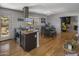 Modern kitchen with granite countertops and island seating at 8227 E Hubbell St, Scottsdale, AZ 85257