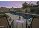 Enjoy a glass of champagne poolside in this relaxing setting at 8227 E Hubbell St, Scottsdale, AZ 85257