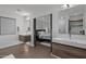 Double vanity bathroom with view of bedroom and backyard at 840 W Earll Dr, Phoenix, AZ 85013