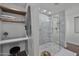 Contemporary bathroom with walk-in shower and floating shelves at 840 W Earll Dr, Phoenix, AZ 85013