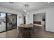 Bright dining area with sliding glass doors leading to a patio at 840 W Earll Dr, Phoenix, AZ 85013