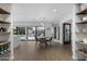 Modern dining room with wood floors and a view to backyard at 840 W Earll Dr, Phoenix, AZ 85013