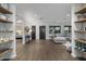 Modern entryway with wood floors and built-in shelving at 840 W Earll Dr, Phoenix, AZ 85013