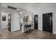 Bright entryway with wood floors and modern console table at 840 W Earll Dr, Phoenix, AZ 85013