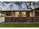 Contemporary home with a covered porch and stylish seating area at 840 W Earll Dr, Phoenix, AZ 85013