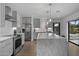 Sleek kitchen featuring stainless steel appliances and marble countertops at 840 W Earll Dr, Phoenix, AZ 85013