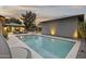 Luxury backyard with a refreshing pool and ample patio space for relaxation at 840 W Earll Dr, Phoenix, AZ 85013