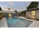 Relaxing pool area with a unique lounger and attractive landscaping at 840 W Earll Dr, Phoenix, AZ 85013