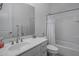 Clean bathroom with white vanity, bathtub, and shower at 8400 E Columbus Ave, Scottsdale, AZ 85251