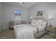 Spacious bedroom with a king-size bed and neutral decor at 8400 E Columbus Ave, Scottsdale, AZ 85251