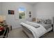 Guest bedroom with queen bed and neutral decor at 8400 E Columbus Ave, Scottsdale, AZ 85251