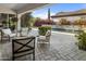 Covered patio furniture with views of the refreshing pool at 8400 E Columbus Ave, Scottsdale, AZ 85251