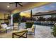 Covered patio with comfortable seating overlooking the pool at 8400 E Columbus Ave, Scottsdale, AZ 85251