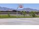 Outdoor basketball court with mountain views at 8656 W Warner St, Tolleson, AZ 85353