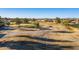 Aerial view of a golf course with a pathway at 9754 E Natal Ave, Mesa, AZ 85209