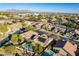 Aerial view showing home, pool, and neighborhood at 9754 E Natal Ave, Mesa, AZ 85209