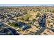 Aerial view of a luxury home community with a golf course at 9754 E Natal Ave, Mesa, AZ 85209