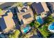 Aerial view of house, pool, and surrounding homes at 9754 E Natal Ave, Mesa, AZ 85209