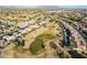 Aerial view of community and golf course at 9754 E Natal Ave, Mesa, AZ 85209