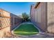 Artificial turf putting green in a spacious backyard at 9754 E Natal Ave, Mesa, AZ 85209