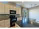 Bright kitchen with granite countertops and backyard access at 9754 E Natal Ave, Mesa, AZ 85209