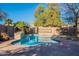 Relaxing kidney-shaped pool with stone accents at 9754 E Natal Ave, Mesa, AZ 85209