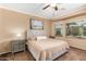 Spacious bedroom with large windows and neutral decor at 10902 E Silver Mine Rd, Gold Canyon, AZ 85118