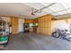 Spacious garage with built-in cabinets and shelving at 10902 E Silver Mine Rd, Gold Canyon, AZ 85118