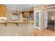 Kitchen boasts granite counters, wood cabinets, and a pantry at 10902 E Silver Mine Rd, Gold Canyon, AZ 85118