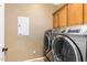 Laundry room with washer and dryer included at 10902 E Silver Mine Rd, Gold Canyon, AZ 85118