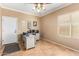 Home office with built-in desk and ample natural light at 10902 E Silver Mine Rd, Gold Canyon, AZ 85118