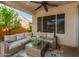 Covered patio with comfortable seating area at 10902 E Silver Mine Rd, Gold Canyon, AZ 85118
