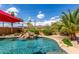 Relaxing pool with a waterfall feature at 10902 E Silver Mine Rd, Gold Canyon, AZ 85118