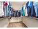 Large walk-in closet with ample shelving and hanging space at 10902 E Silver Mine Rd, Gold Canyon, AZ 85118