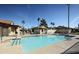 Inviting community pool with surrounding patio at 1120 N Val Vista Dr # 123, Gilbert, AZ 85234