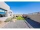 Landscaped backyard with gravel and artificial turf at 12387 E Black Rock Rd, Scottsdale, AZ 85255