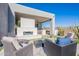 Relaxing patio with fireplace and comfortable seating at 12387 E Black Rock Rd, Scottsdale, AZ 85255