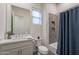 Clean bathroom with white vanity and shower/tub combo at 12387 E Black Rock Rd, Scottsdale, AZ 85255