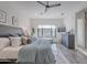 Bright bedroom featuring a king-size bed and large window at 12387 E Black Rock Rd, Scottsdale, AZ 85255