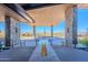 Clubhouse entrance with water feature and desert landscape at 12387 E Black Rock Rd, Scottsdale, AZ 85255