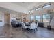 Open concept kitchen and dining area with modern appliances and large windows at 12387 E Black Rock Rd, Scottsdale, AZ 85255